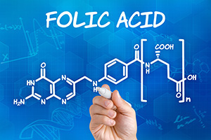 hand drawing the chemical structure of Folic Acid